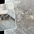 Schizza sfiorando il volto di una signora