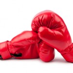 Red boxing gloves isolated on white